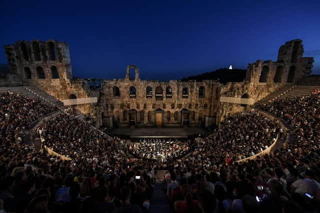 The audience gathers for a performance of Verdi's opera Nabucco at the Odeon of Herodes Atticus in Athens (Picture: Aris Messinis/AFP via Getty Images)