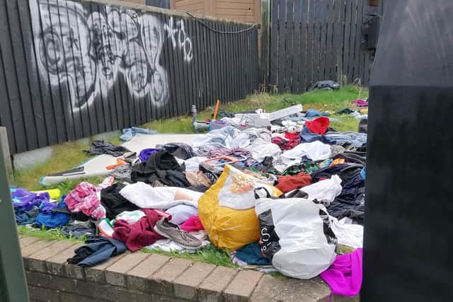 A lot of the clothes were left on the grass. Picture: Allan Crowe