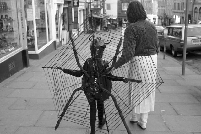 Fiona Kukk, aged six, in spider costume for the Guisers Parade on Edinburgh's Royal Mile, a highlight of the Guys and Guisers programme of performing arts specially for children around Halloween, October 1988.