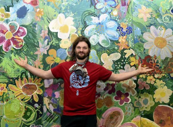 Christopher Rutterford with the mural in Colinton tunnel   Photo: Lisa Ferguson