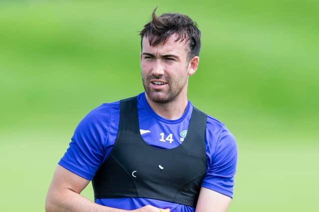 Stevie Mallan takes part in training at Hibs' East Mains training complex