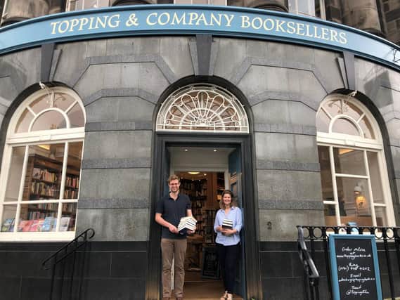 Hugh and Cornelia Topping outside Topping & Company's Edinburgh bookstore