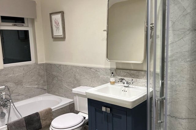Stylish family bathroom has a modern finish