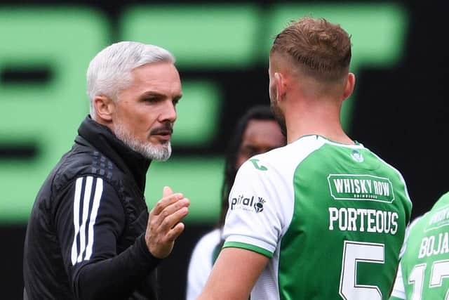 Aberdeen Mmanager Jim Goodwin shakes hands with Ryan Porteous after the match at Easter Road in September. Picture: Mark Scates / SNS