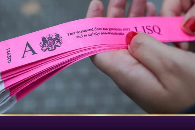 Removed from sale: eBay has taken down any sales of wristbands issued for the public attending the Queen's lying in state