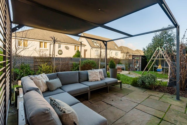 A real feature of this property is the superb, landscaped garden to the rear, which includes a large Sandstone paved patio, ideal for outside dining/relaxing.