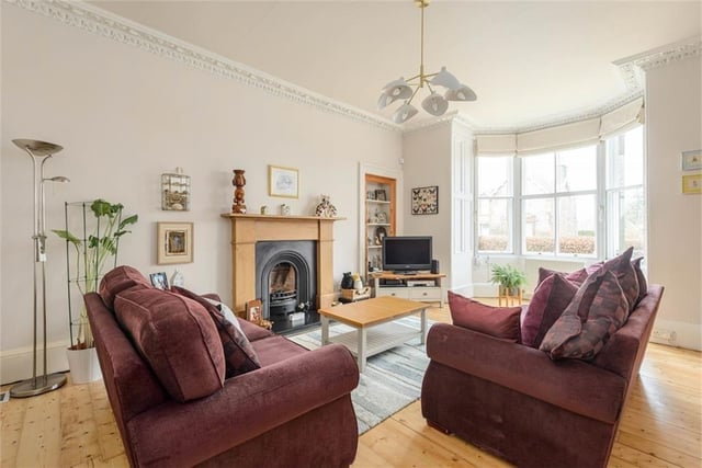 ESPC buyers loved this four-bed semi-detached house in Currie, valued at £625,000, with stunning views of the open countryside, a range of charming period features, a country kitchen and south facing garden grounds which consist of areas of lawn, mature trees, shrub beds and a pond.