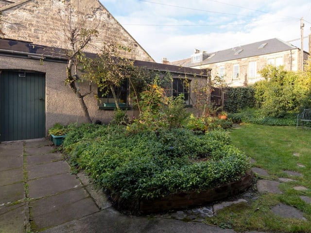 The property boasts an exceptionally large garage which has an electric door, power and light, and offers a fantastic space that can be used for a variety of purposes.