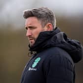 Lee Johnson casts an eye over his squad as they prepare to face Hearts. The Hibs boss will hope to mastermind a much-needed win against their rivals