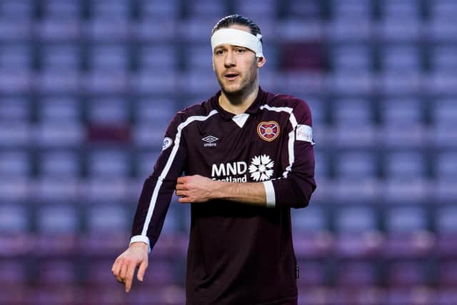 Peter Haring was forced to wear a bandage around his head on Saturday after a clash of heads. Picture: SNS
