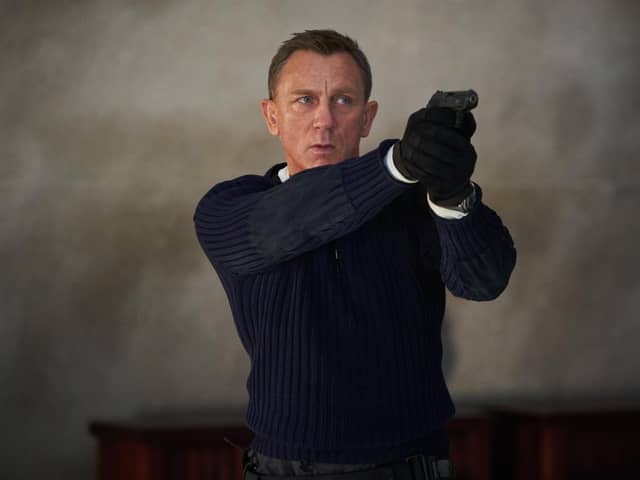 James Bond (Daniel Craig) prepares to shoot in NO TIME TO DIE,  a DANJAQ and Metro Goldwyn Mayer Pictures film.
Credit: Nicola Dove