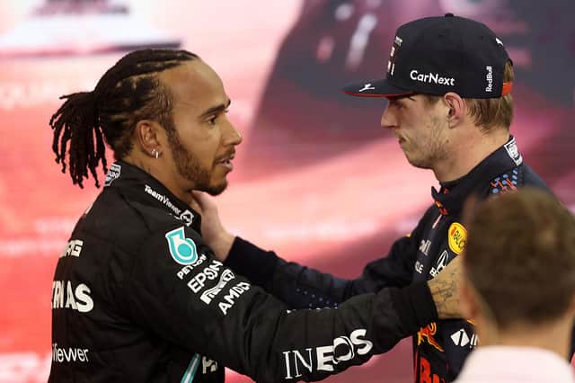 Max Verstappen is congratulated by runner up in the race and championship Lewis Hamilton after Grand Prix of Abu Dhabi on December 12. Picture: Lars Baron/Getty