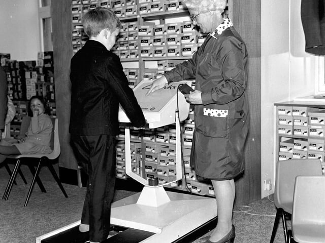 Baird's shoe stores could be found all over the Capital at one time. This young boy is having his feet measured at the South Bridge branch in 1971.