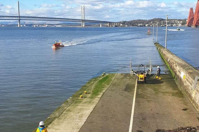 Queensferry Lifeboat heads back to shore after rescuing six adults, two children and a dog from Cramond Island on Saturday