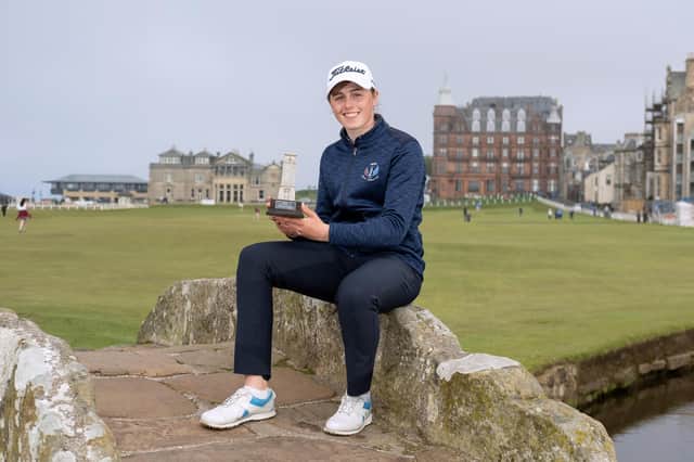Broomieknowe's Hannah Darling shows off the St Rule Trophy after the last round on the Old Course. Picture: St Andrews Links Trust.