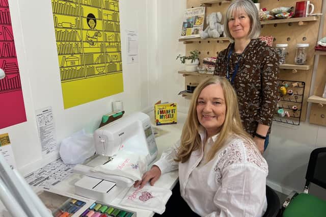 Laura Paris working at the Gorebridge hub with manager Alison Dunwell.