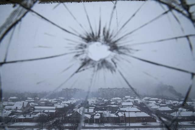 A view from a hospital window broken by shelling in Mariupol. 
(AP Photo/Evgeniy Maloletka)