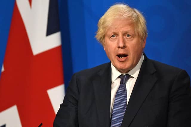 Boris Johnson gives an update on relaxing restrictions at Downing Street