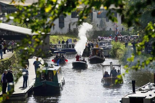 Boats of all shapes and sizes navigate the Forth and Clyde Canal at Kirkintilloch. Photograph: Peter Sandground