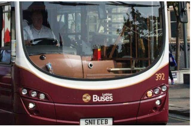 A Lothian bus driver has been hit by a stone, thrown at his vehicle while he was travelling through Gorebridge, Midlothian.