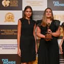 Johnnie Walker Princes Street's experience manager Anastasia Neagu, centre, with the award for the World’s Leading Spirit Experience at the World Travel Awards.