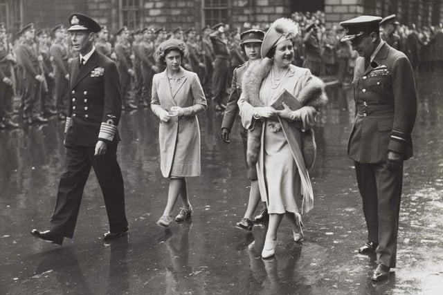 In 1945, a young Princess Elizabeth and her sister Princess Margaret joined their parents King George VI and Queen Elizabeth on a two-day visit to Edinburgh.
It marked a national celebration of final victory in World War II and included a march-past in Princes Street by Forces of all categories. Crowds lined the streets to watch the procession.
Later, the Royal party made a late-night tour to observe celebratory bonfires and firework displays. The visit also included several investiture ceremonies at the Palace of Holyroodhouse as well as a service at St Giles Cathedral, before they continued on to other parts of Scotland.