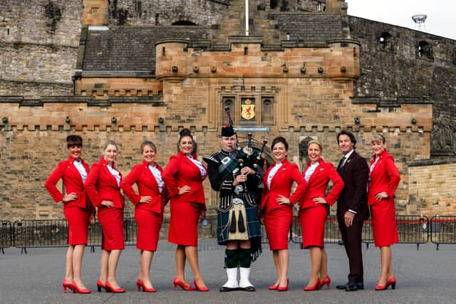 Virgin Atlantic's cabin crew with piper Conner Pratt. Pictures: Ian Georgeson Photography