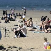 Edinburgh is set to bask in sun this week, with temperatures hotter here than in Los Angeles, with locals expected to flock to Portobello Beach this week. Pic Lisa Ferguson .