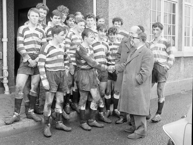 The Royal High School rugby team are congratulated on their 100 per cent winning record by Mr W Emble in March 1964.