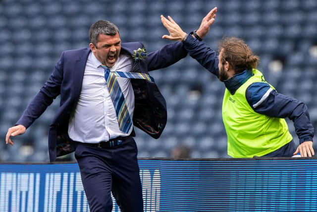 St Johnstone manager Callum Davidson (left) celebrates his side's goal with Stevie May