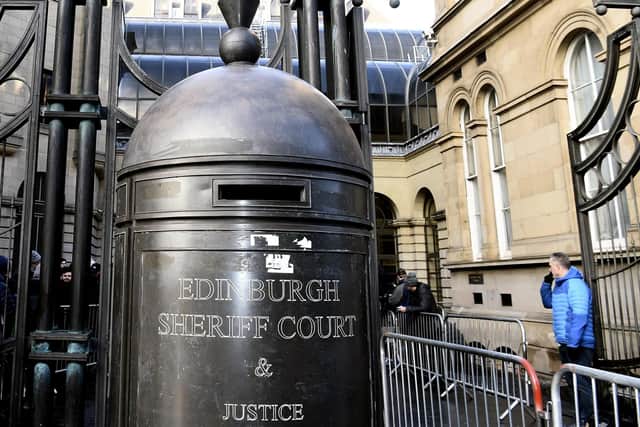 Shaun Miuir was jailed when he appeared at Edinburgh Sheriff Court for sentence for attacking his partner.  Picture: Lisa Ferguson.