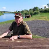 Derek Plenderleith with the middle lake at Tweeddale behind him