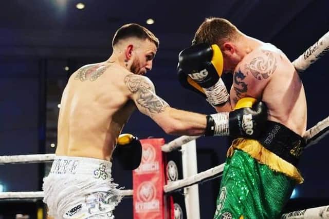 Robbie Graham, left, won his first professional fight against Gary McGuire in April.