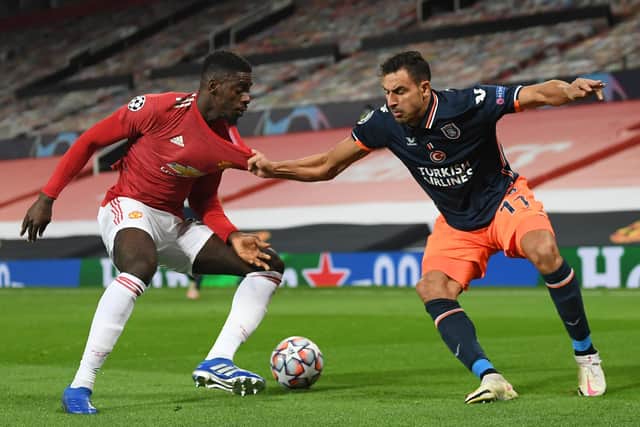 Axel Tuanzebe of Manchester United and Nacer Chadli of Basaksehir battle for the ball during the Champions League Group H stage match at Old Trafford in November 2020. Picture: Michael Regan/Getty