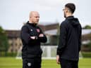 Hearts manager Steven Naismith with one of the club's backroom staff at Riccarton.