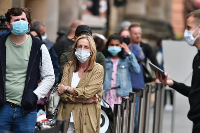 Face masks are now required in communal areas in offices