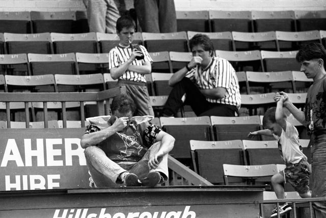 Distraught Wednesday fans struggle to come to terms with their side's relegation from the top flight in May 1990.