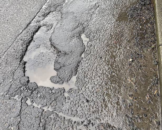 Just some of the potholes said to have damaged cars on Lanark Road West