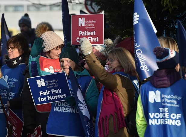 <p>Nurses on strike at the Ulster Hospital during the last walkout two years ago</p>