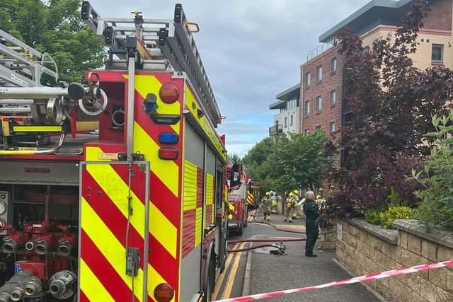 Firefighters arrived on the scene soon after Mr Neill and a neighbour dragged a man out of the burning building on Slateford Gait. (Photo credit: Garrie Neill)
