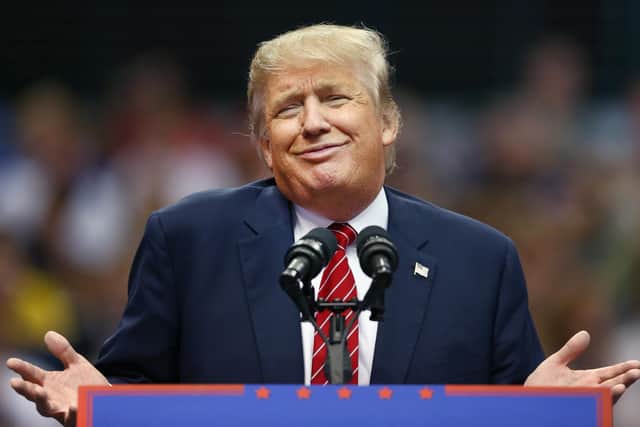 Donald Trump, in a rare moment when he's not actually talking (Picture: Tom Pennington/Getty Images)