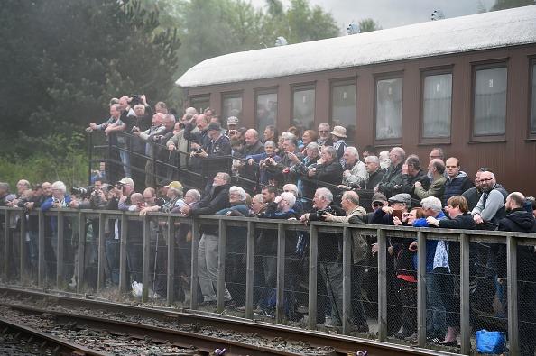 Steam train enthusiasts gather at Bo'ness and Kinneil Railway to see the Flying Scotsman on May 16, 2016 in Bo'ness, Scotland.  The Flying Scotsman arrived in Edinburgh Waverley Station on Saturday evening, it's the first trip to Scotland since the locomotive underwent a ten year restoration.
