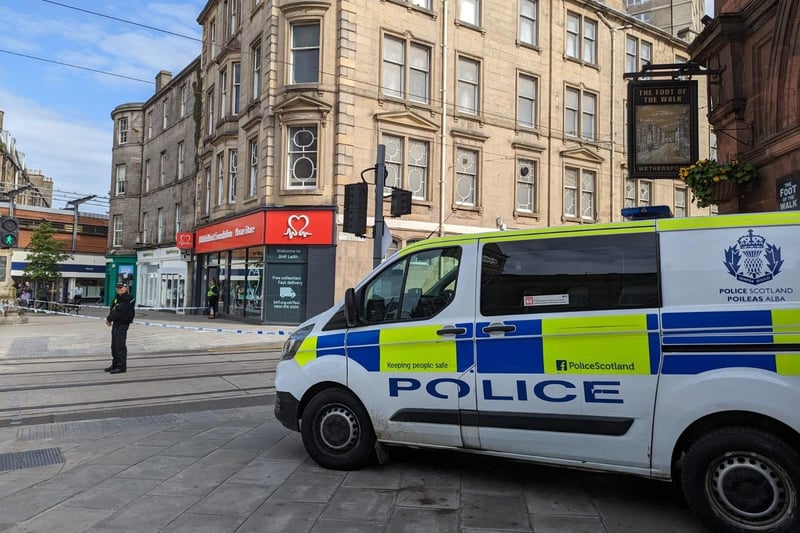 Police at the scene of the incident near the British Heart Foundation in Constitution Street, Leith.