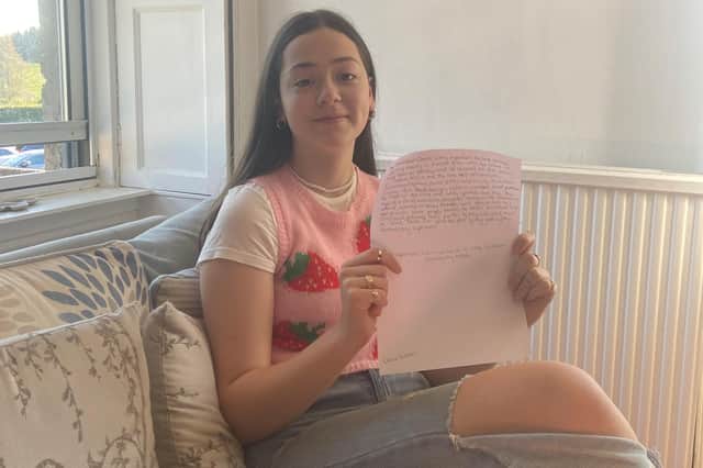 Chloe Aitken from Penicuik, pictured with her story.