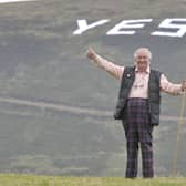 Former independent Midlothian councillor Peter De Vink, pictured in 2014 during the Scottish Independence referendum campaign, when he had YES painted onto a hill on his estate on the Edinburgh Airport flightpath. Photo by Ian Rutherford