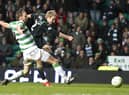 Danny Galbraith fires in a last-minute winner for Hibs at Celtic Park in January 2010. Picture: SNS