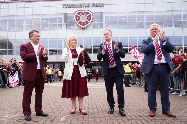 (Left to right) Heart of Midlothian minority owner Tony Bloom, former Heart of Midlothian owner Ann Budge, chairman Calum Paterson and CEO Andrew McKinlay, acknowledge the fans at Tynecastle Park in Edinburgh, after their team lost the Scottish Premier League championship decider against Celtic. Picture PA/Jane Barlow