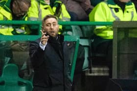 Lee Johnson gives instructions from the touchline during Hibs' 2-0 defeat by Ross County