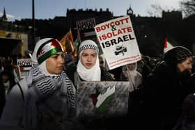 Protesters participate in a Pro-Palestinian march at Waverley Bridge on November 11
Photo by Jeff J Mitchell/Getty Images)