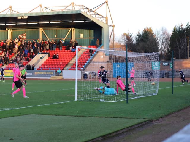 Tranent stand-in goalkeeper Dean Beveridge, who was drafted in after an injury to No Kevin Swain in the warm-up, is helpless as Stirling Albion find the net. Picture: Graham Hamilton